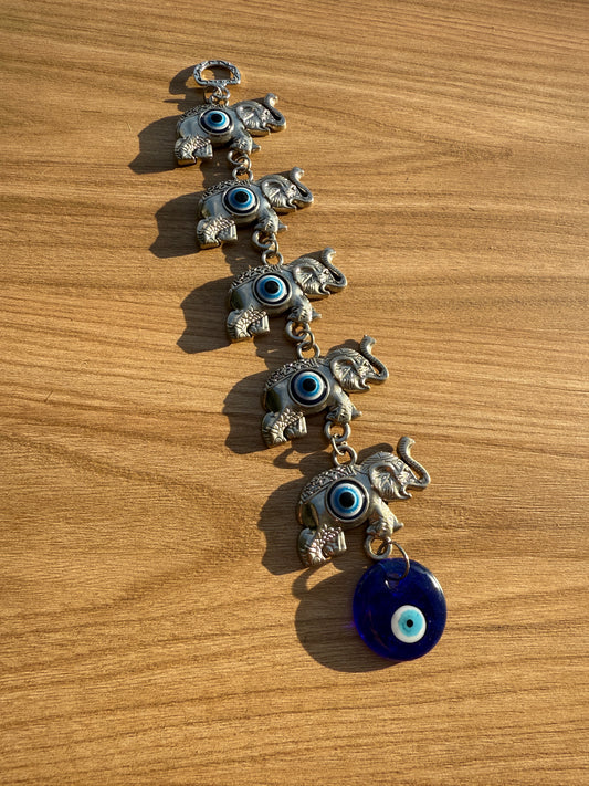 Amuleto 5 elefantes con ojo turco