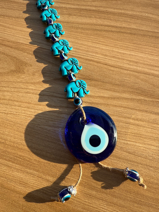 Ojo turco con 7 elefantes azules