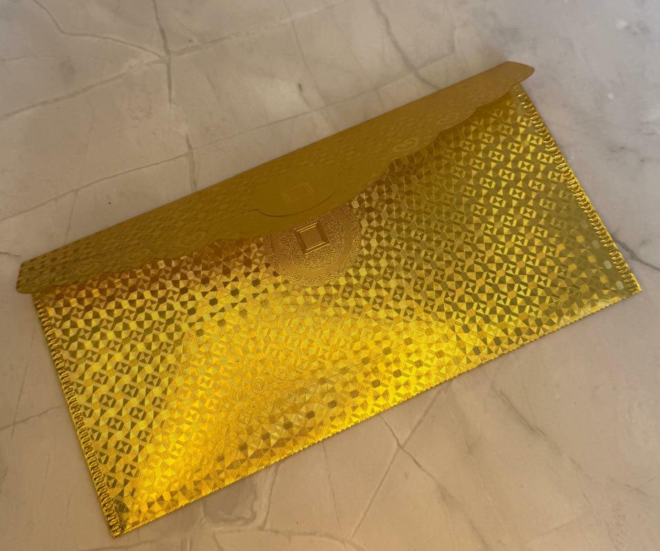 Sobre de Dólar dorado