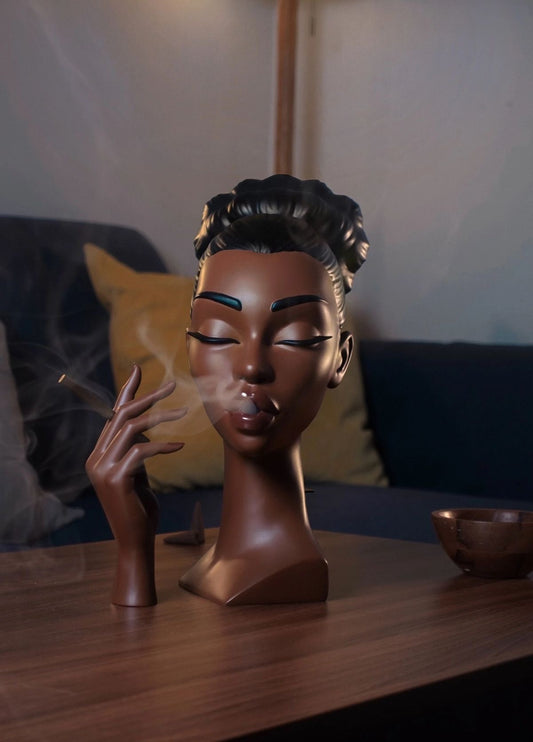 Quemador de Negra Fumando