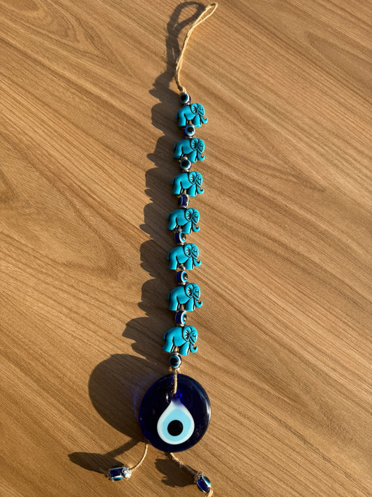 Ojo turco con 7 elefantes azules